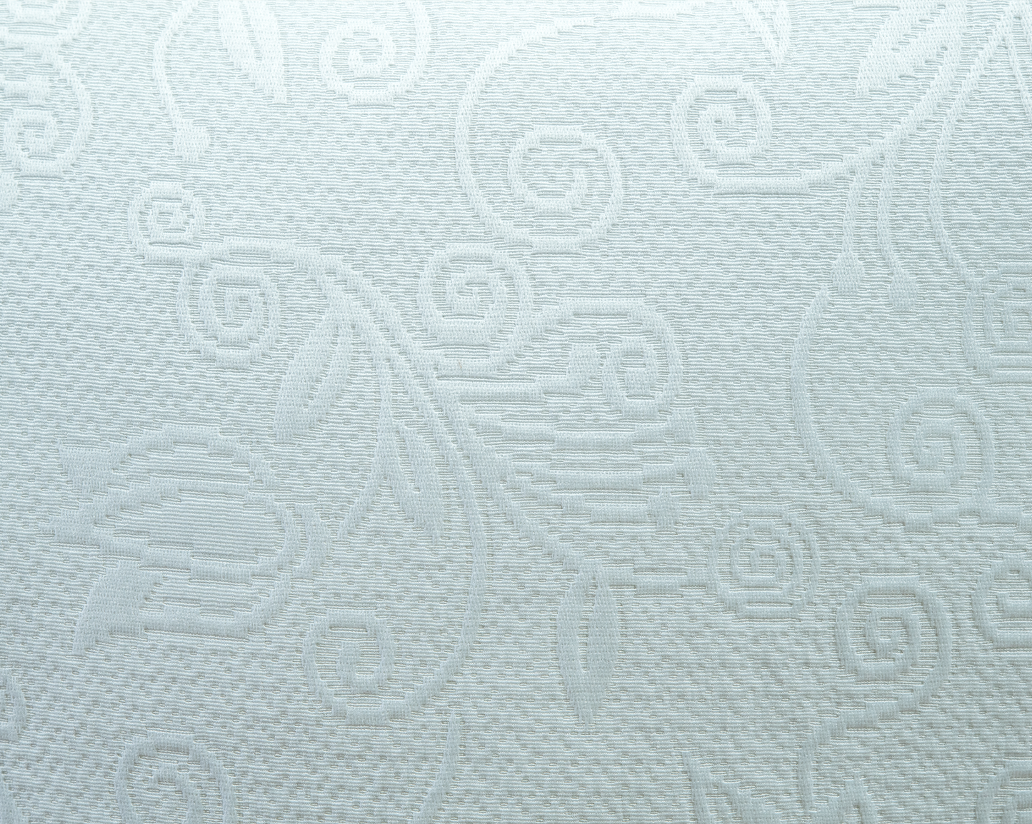 Textura suave y natural del cojín lector Piqué Blanco de La Casa de los Gansos, vista en primer plano
